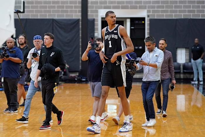 San Antonio Spurs center Victor Wembanyama enters the court during Media Day.